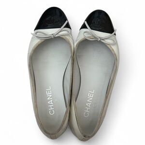 white and black chanel cap toe flats